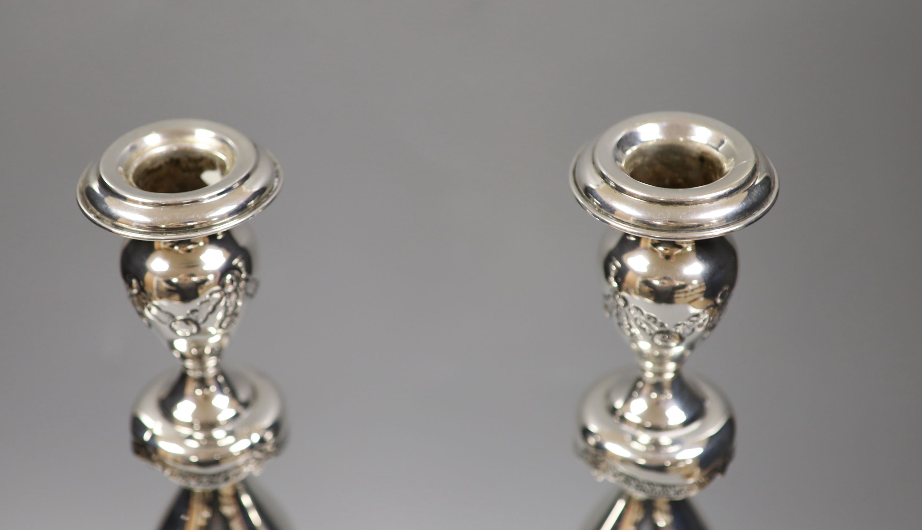 A pair of George V silver Sabbath Day candlesticks, Morris Salkind?, London, 1921, 36.9cm